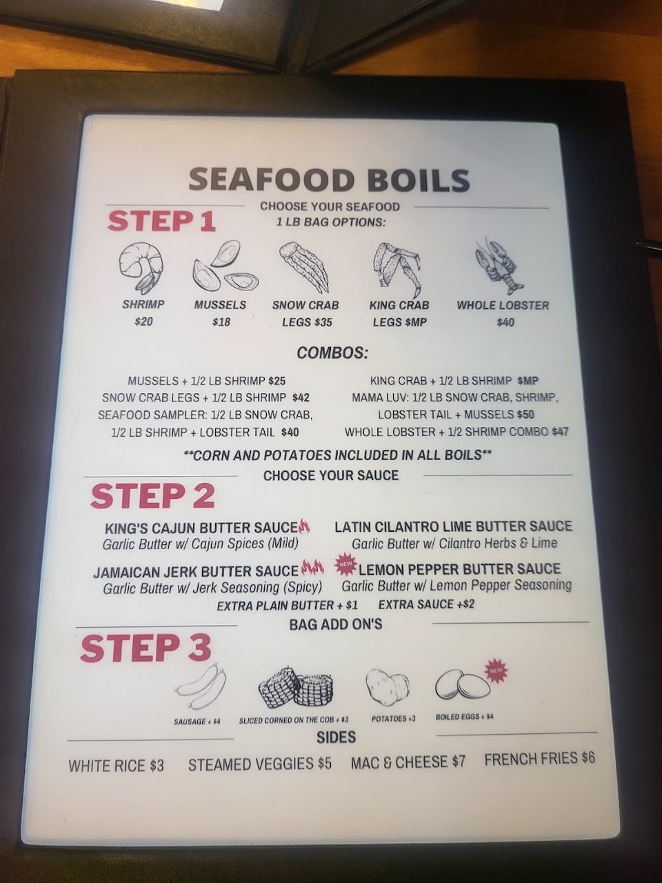Printed menu with appetizers, entrees, and sides.